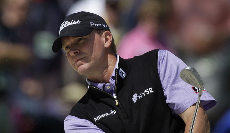 Steve Stricker hits a shot out of a bunker at the Masters.