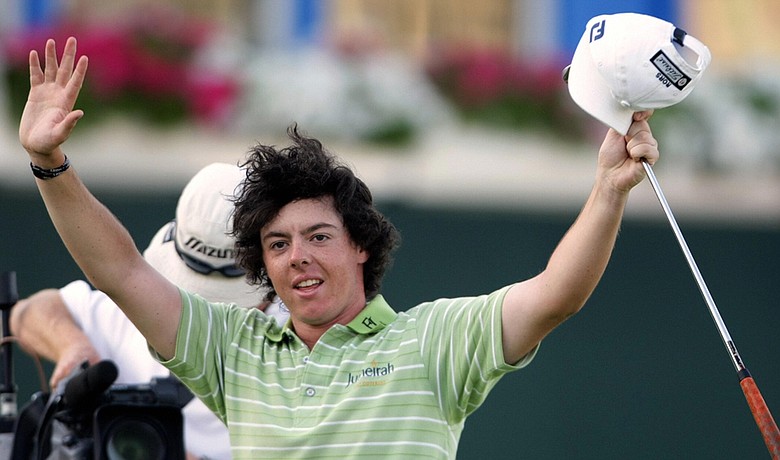 Rory McIlroy celebrates after winning the 2009 Dubai Desert Classic.