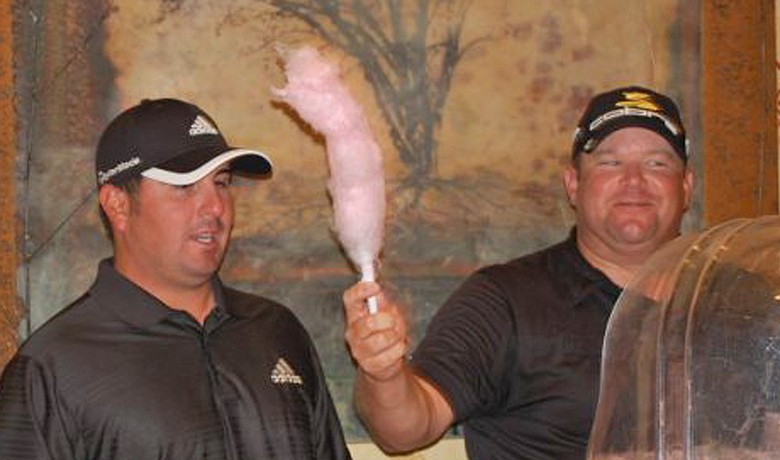 Pat Perez (left) and Jason Gore make cotton candy.