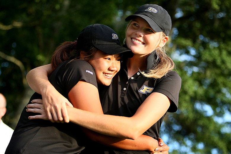 Purdue's Maude-Aimee LeBlanc (right) and Numa Gulyanamitta celebrate after winning the NCAA Women's Championship.