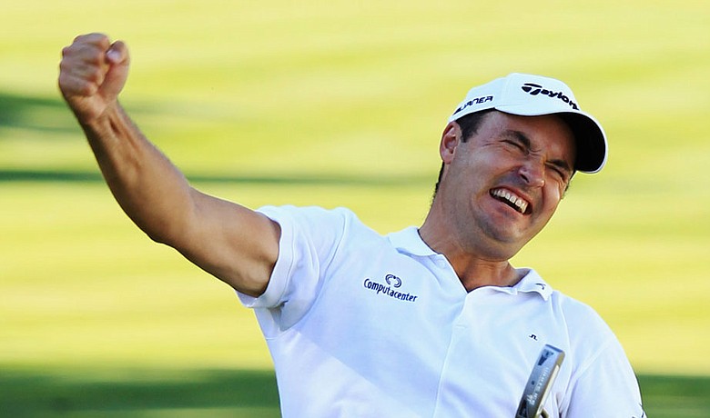 Simon Khan celebrates after making birdie on No. 18 during the final round of the BMW PGA Championship.