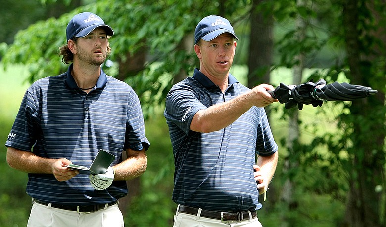 North Florida head coach Scott Schroeder (right) and J.C. during the first round of the NCAA Championship.