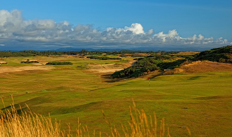Old Macdonald's seventh hole utilizes a huge dune overlooking the Pacific.