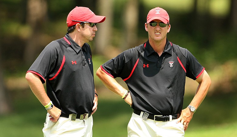 Texas Tech assistant coach, Marty McCauley (left) and head coach Greg Sands at No. 18 at The Honors Course during Thursday's final round of stroke play at the NCAA Championship.