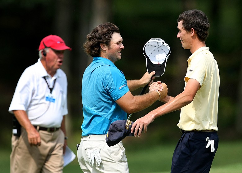 Augusta State's Patrick Reed and Georgia Tech's Chesson Hadley shake hands at the conclusion of their match Friday.