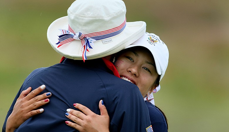 Stephanie Kono gets a hug from Team USA captain Noreen Mohler.