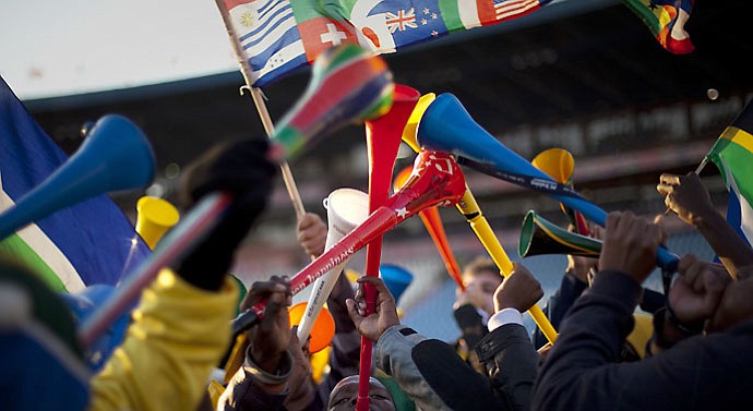 Soccer fans blow vuvuzelas in a fan zone near Pretoria, South Africa on Wednesday. The noisemakers are banned on the PGA Tour, of course. But Ernie Els is open to the idea to allow them during the practice rounds. Seriously?