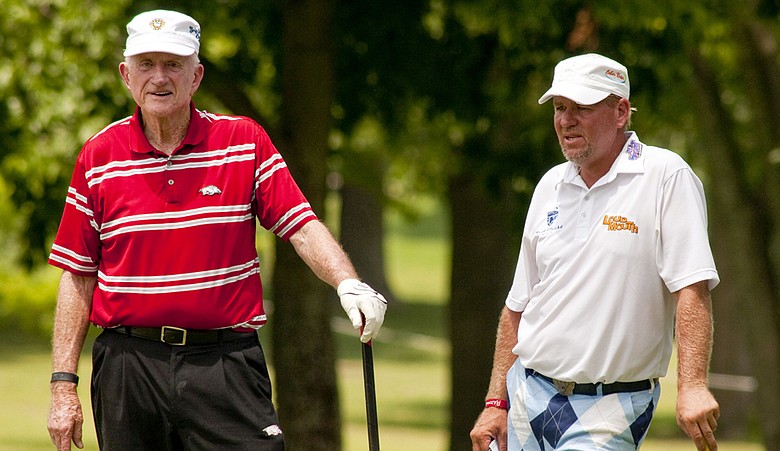 John Daly, right, during the pro-am for the Nationwide Tour's Fort Smith Classic.