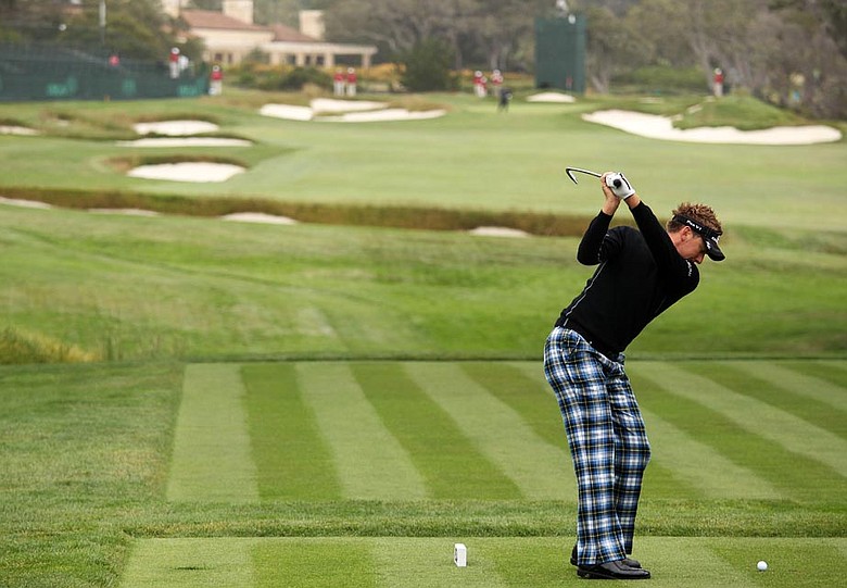 Ian Poulter warms up for the U.S. Open.