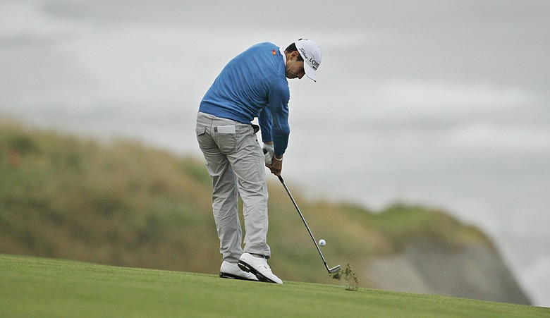 Rafael Cabrera-Bello hits into the 10th hole during the first round of the U.S. Open.