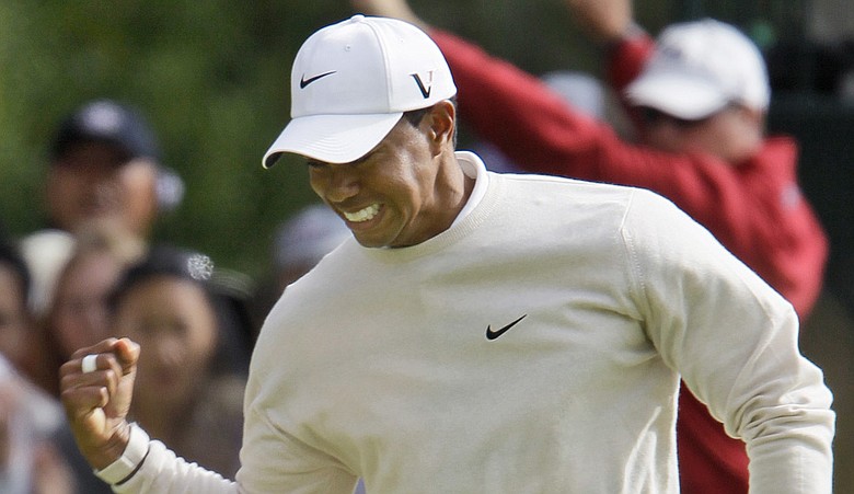 Tiger Woods reacts after birdieing the 16th hole Saturday at the U.S. Open.