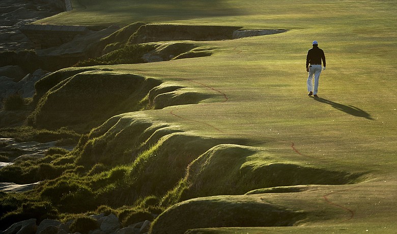 Phil Mickelson walks down the 18th fairway during the third round of the 2010 U.S. Open.