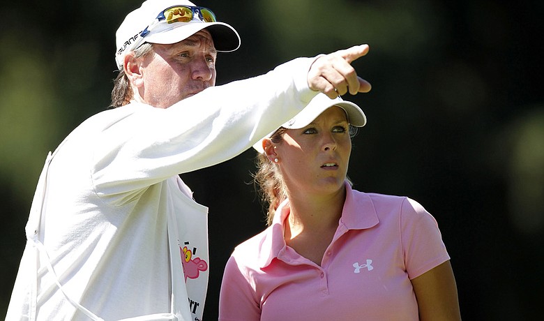 Mallory Blackwelder talks to her caddie during the first round of the Jamie Farr Owens Corning Classic.