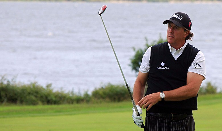 Phil Mickelson watches a shot from the fairway during a Pro-Am prior to The Barclays Scottish Open.