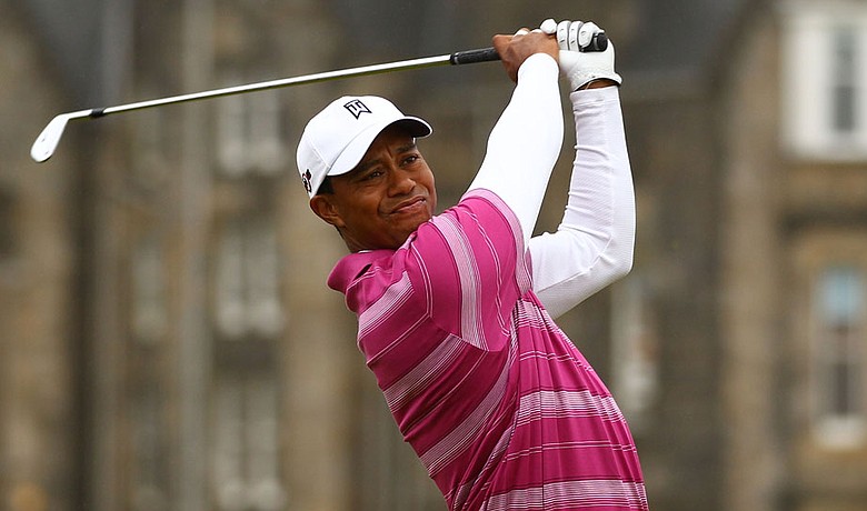 Tiger Woods tees off on the second hole during the first round of the British Open.