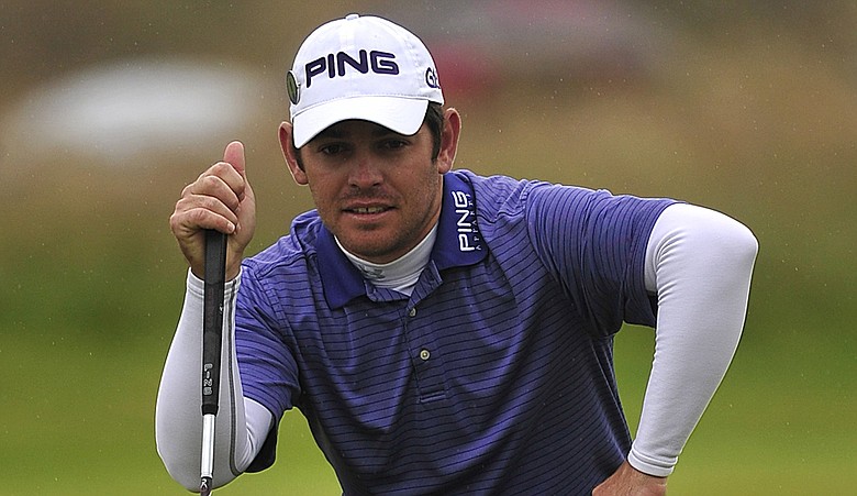 Louis Oosthuizen reads a putt during Round 2 of the British Open.