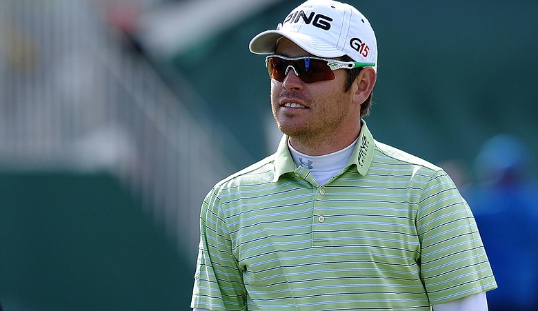 Louis Oosthuizen held his British Open lead for the entire third round.
