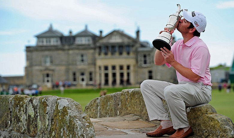 Louis Oosthuizen kisses the Claret Jug a day after winning the British Open.