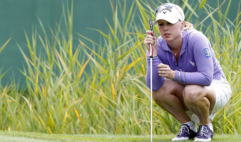 Morgan Pressel studies a putt on the fifth hole during the third round of the Evian Masters.