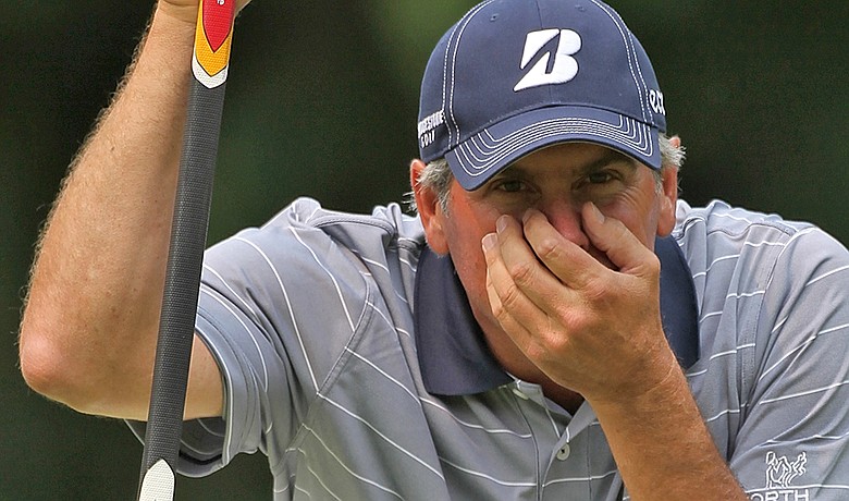 Fred Couples lines up a putt during the final round of the U.S. Senior Open.
