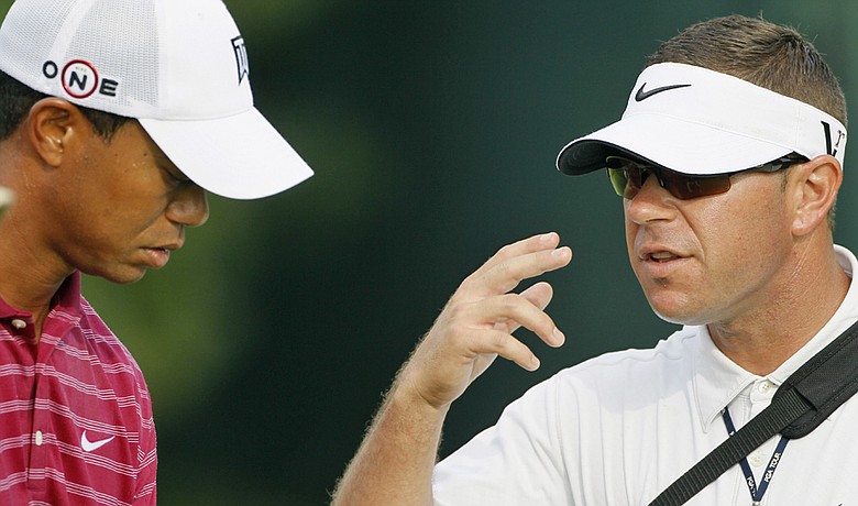 Tiger Woods and Sean Foley talk Aug. 10 at the PGA Championship.