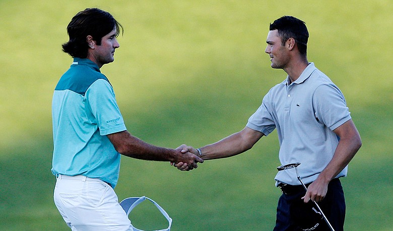 Bubba Watson (left) congratulates Martin Kaymer after Kaymer won the PGA Championship.