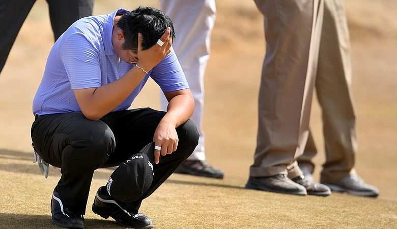 Byeong-Hun An reacts after losing to David Chung in the semifinals of the U.S. Amateur Championship.