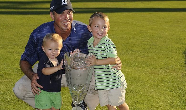 Matt Kuchar poses with sons Carson and Cameron after winning The Barclays.
