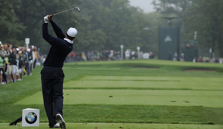 Tiger Woods tees off on the second hole during Round 3 of the BMW Championship.