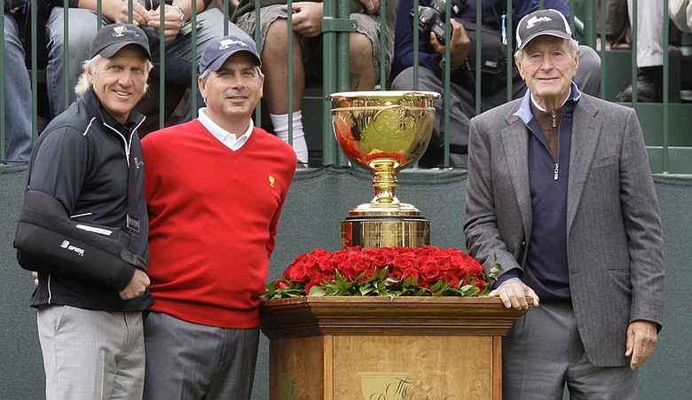From left, Greg Norman, Fred Couples and former President George H.W. Bush during the 2009 Presidents Cup.