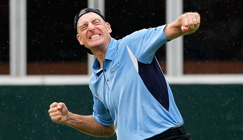 Jim Furyk celebrates his win at the 2010 Tour Championship, which also gave him the $10 million FedEx Cup prize.