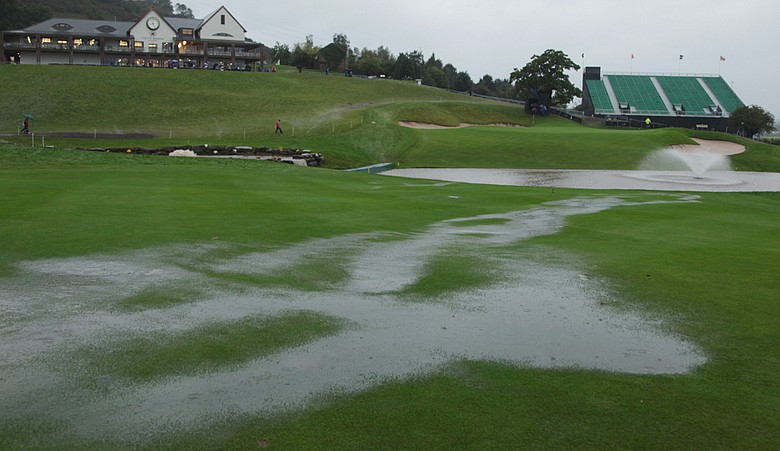 Rain falls on the 18th hole during the weather delay prior to the restart of the fourball and foursomes matches during the 2010 Ryder Cup.