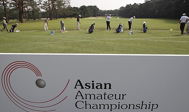 Players on the driving range ahead of the 2010 Asian Amateur Championship at Kasumigaseki Country Club in Kawagoe City, Japan.