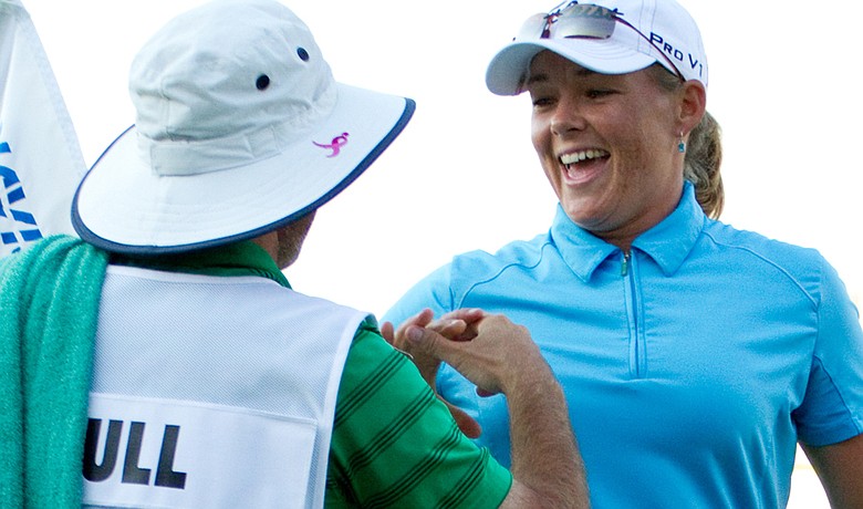 Katherine Hull celebrates with caddie Vern Tess after winning the Navistar LPGA Classic.