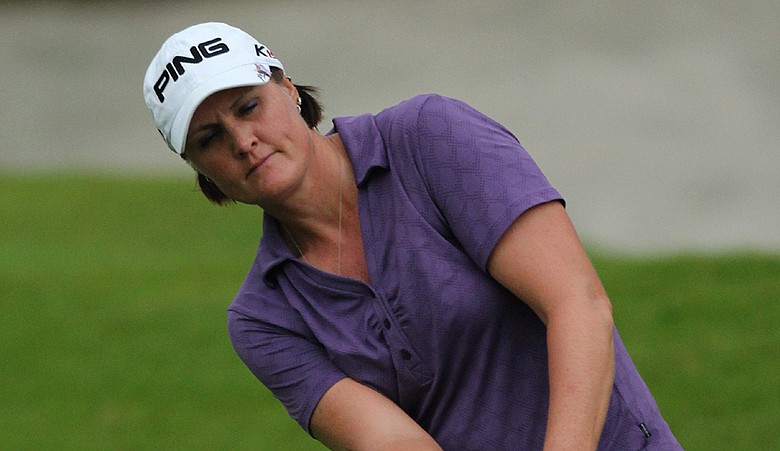 Maria Hjorth chips on the 18th hole during Round 2 of the 2010 Sime Darby LPGA at the Kuala Lumpur Golf and Country Club.