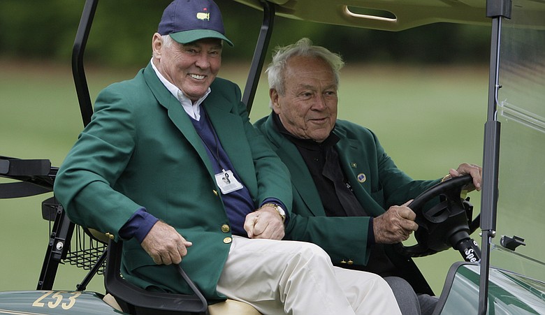 Buzz Taylor, left, and Arnold Palmer during the 2009 Masters.