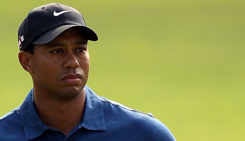 Tiger Woods looks on during the third round of the WGC - HSBC Champions at Sheshan International Golf Club.
