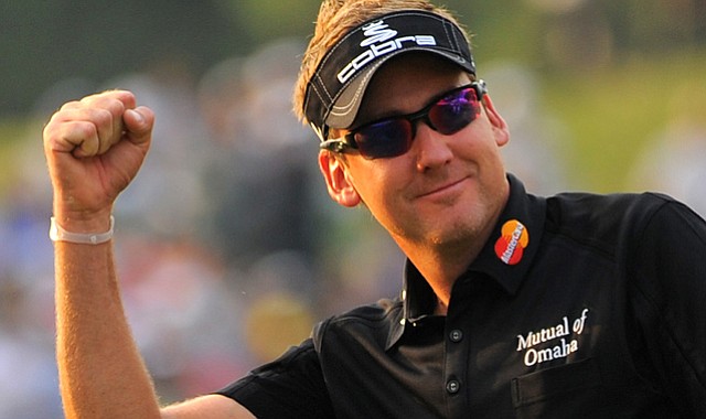 Ian Poulter celebrates on the 18th hole after winning the UBS Hong Kong Open at the Hong Kong Golf Club.