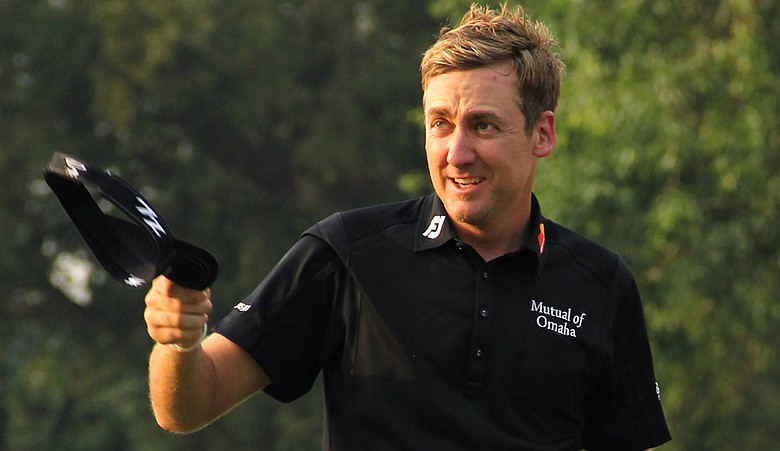 Ian Poulter celebrates on the 18th hole after winning the UBS Hong Kong Open at The Hong Kong Golf Club.