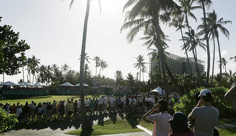 Fans line the 17th green of Waialae Country Club, host of the Sony Open.