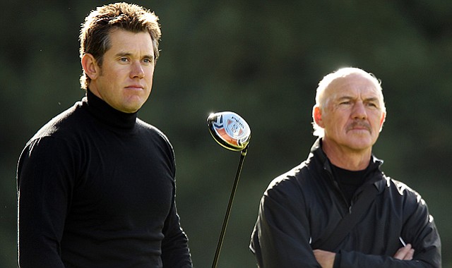 Lee Westwood of England with his coach Pete Cowen during a practice session at the Worksop Golf Club in England.