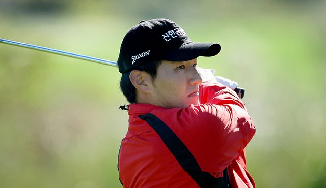 sung-hoon kang hits his tee shot at no. 7 on the panther lake course ...