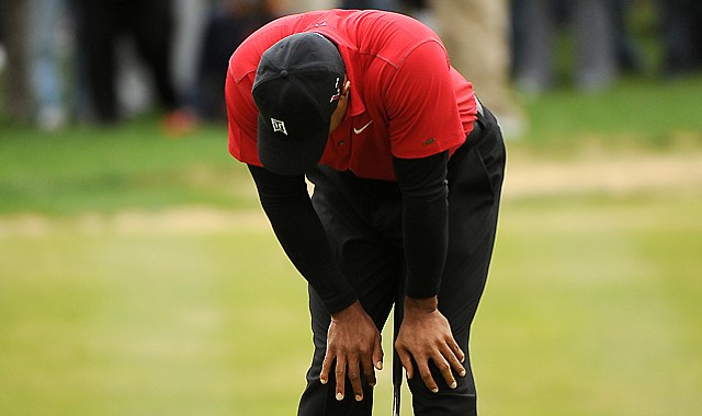 Tiger Woods reacts to missing a birdie putt on the seventh hole green during the final round at the 2010 Chevron World Challenge at the Sherwood Country Club.