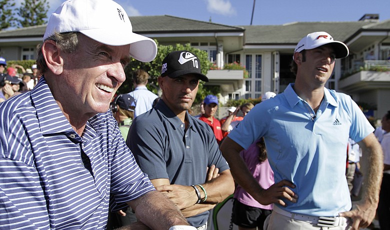PGA Tour commissioner Tim Finchem, surfer Kelly Slater and Dustin Johnson during the Hyundai Tournament of Champions pro-am at Kapalua.