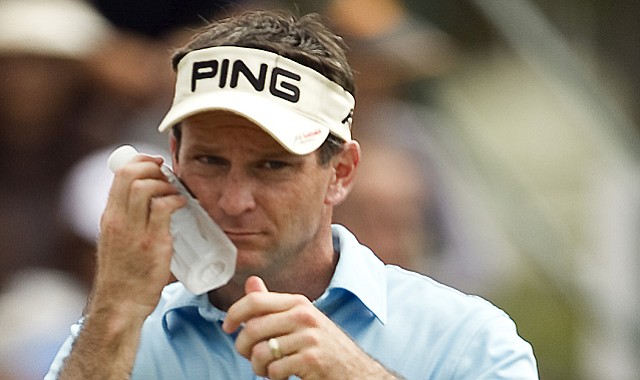 Mark Wilson, who later won, cools off during the final round of the Sony Open, which included 36 holes on Sunday.