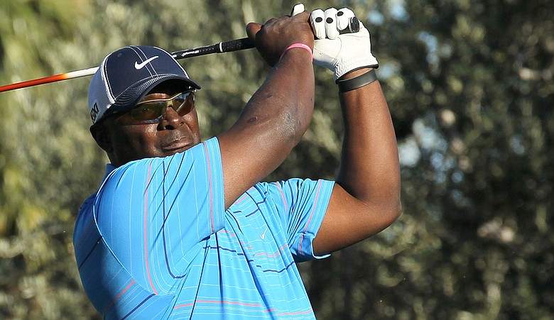 Former NFL receiver Sterling Sharpe hits his tee shot on the 18th hole during round two of the Bob Hope Classic at the La Quinta Country Club.