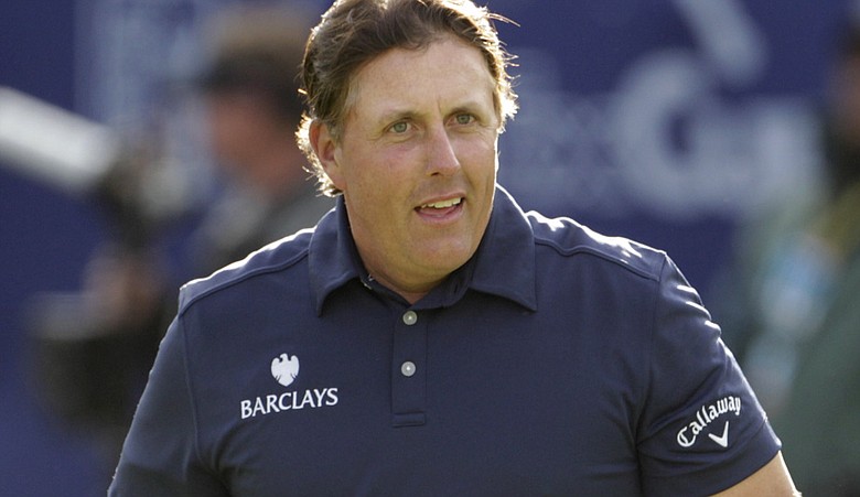 Phil Mickelson sports a smile after making birdie on the final hole but finishes second to Bubba Watson in the Farmers Insurance Open golf tournament in San Diego, Sunday, Jan. 30, 2011.