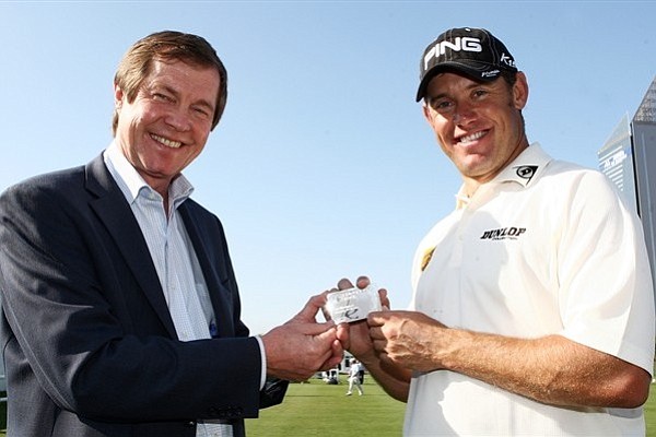 Lee Westwood receives his Honorary Life Membership Card from Tour Chief Executive George O'Grady.