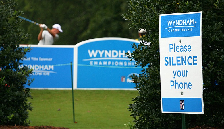 A sign asking for fans to silence their cell phones next to the 15th tee during the 2010 Wyndham Championship.