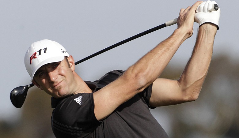 Dustin Johnson hits a shot during the Farmers Insurance Open.
